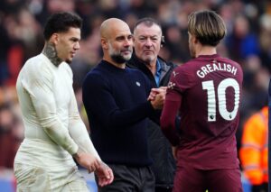 Grealish i Guardiola po wygranym meczu