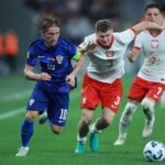 Luka Modrić w pojedynku z Dawidowiczem