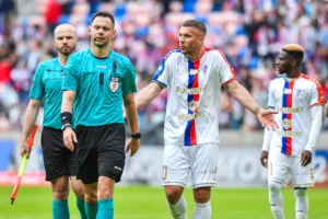 Piotr Rzucidlo i Lukas Podolski