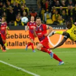 Guirassy strzela podczas meczu