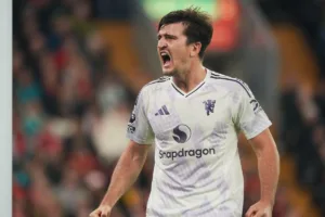 Grafika przedstawiająca piłkarza w euforii.