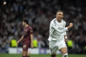 Grafika przedstawiająca radosnego piłkarza.