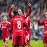 Grafika przedstawiająca radosnych piłkarzy.