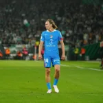 Grafika przedstawiająca piłkarza.