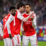 Grafika przedstawiająca grupę zawodników.