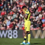 Romero-chowajacy-twarz-w-koszulce